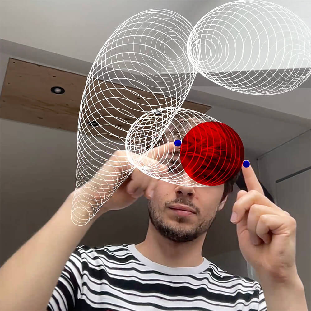 Connecting and disconnecting my index fingers reveals a red ellipse on the screen. The ellipse leaves white traces and forms the letter F.