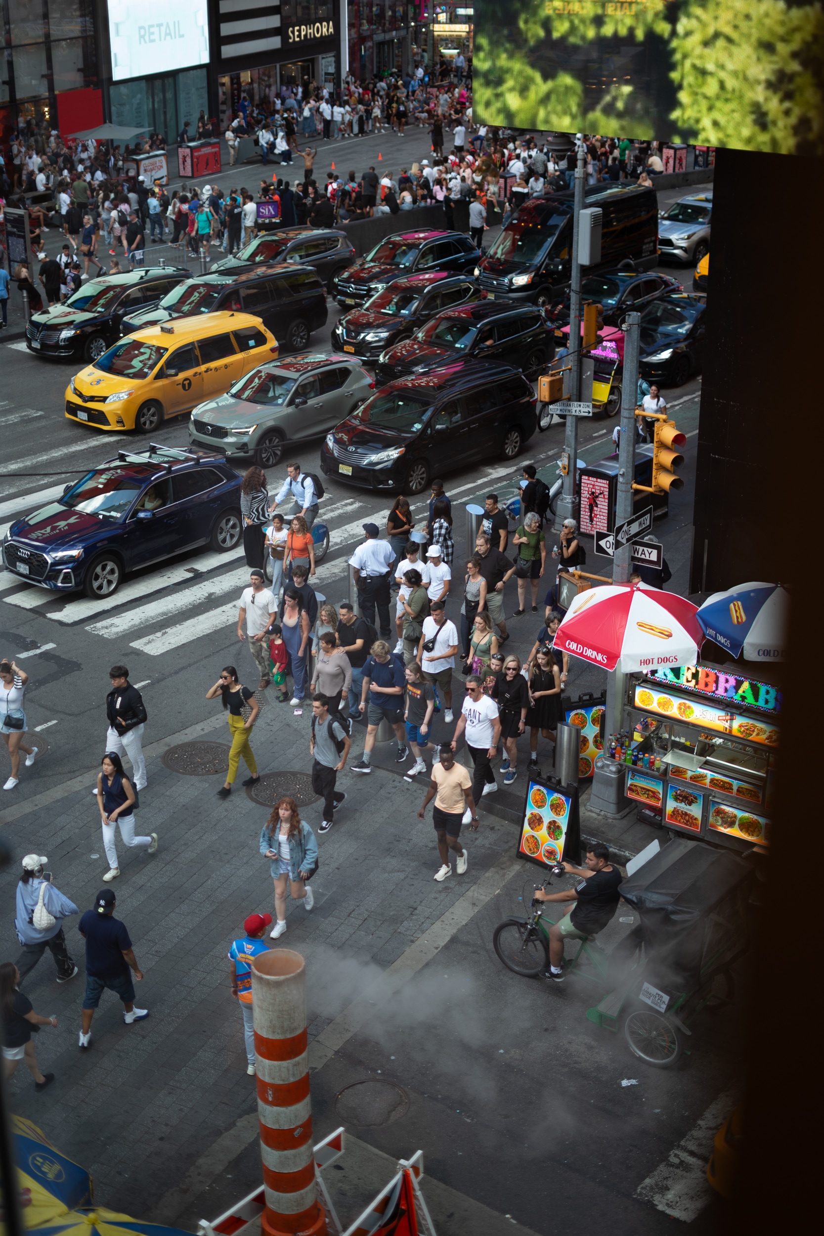 Cars and people stuck in New York traffic