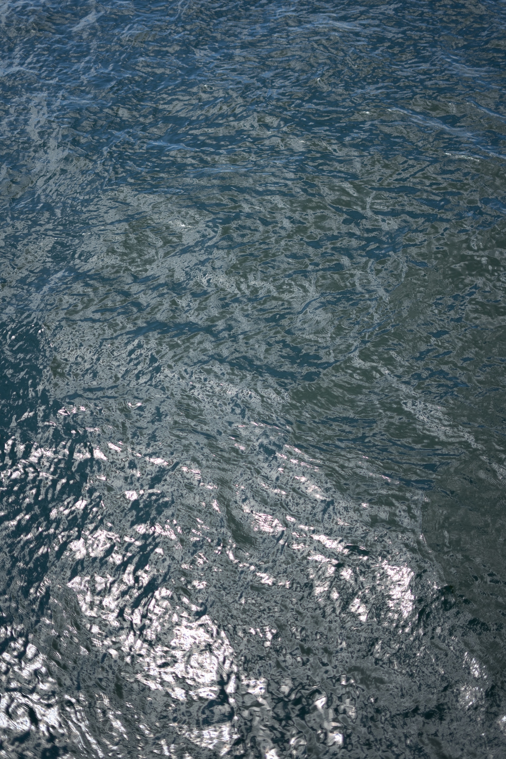 Water surface reflecting the sky